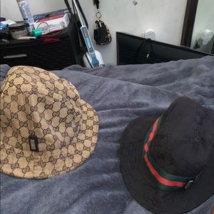Two Gucci bucket hats